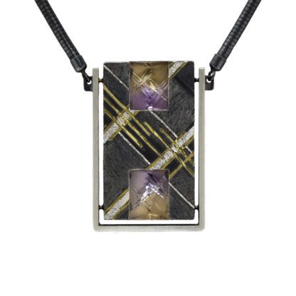 A rectangular necklace with purple and gold design.