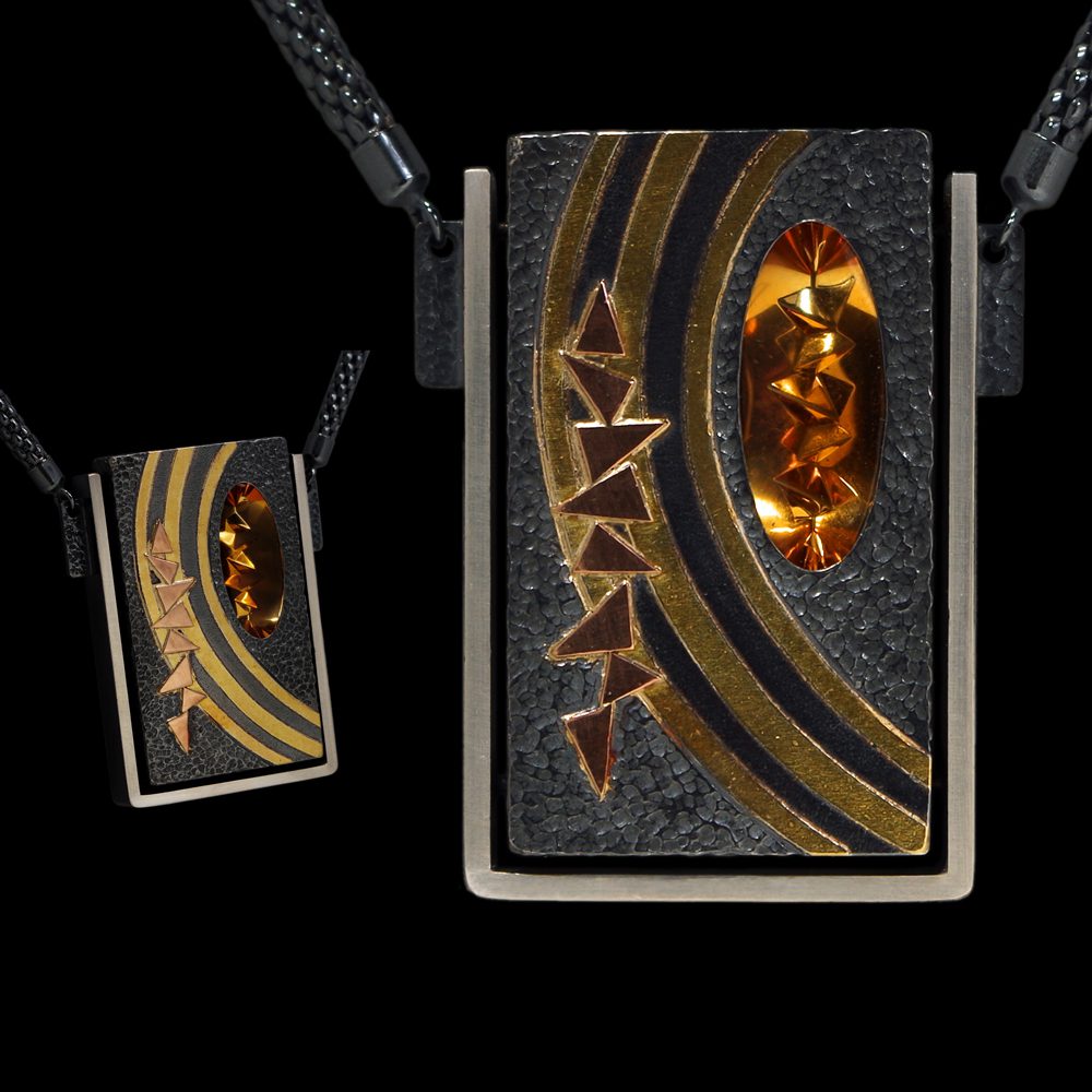 A necklace and pendant with a black background
