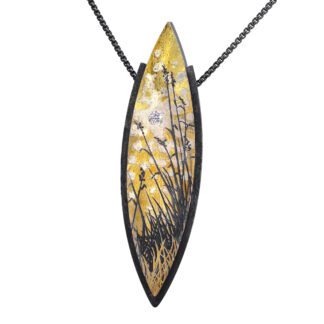 A yellow and black necklace with a leaf design.