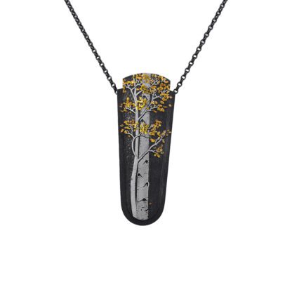 A black and gold necklace with trees on it