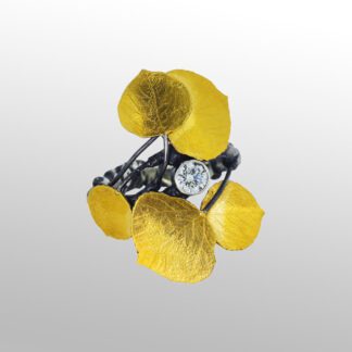 A yellow flower with a clock on it