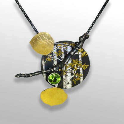 A necklace with a yellow stone and black metal.