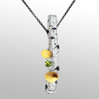 A necklace with a long chain and three different colored stones.