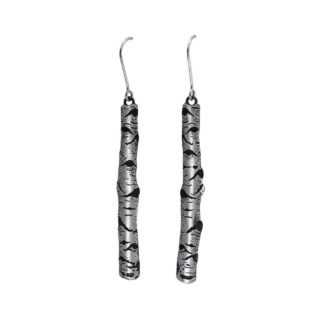 A pair of silver earrings with black lines.