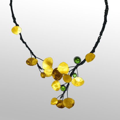 A necklace with yellow beads hanging from it.