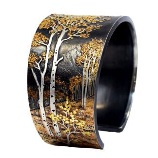 Aspen trees with mountains and leaves